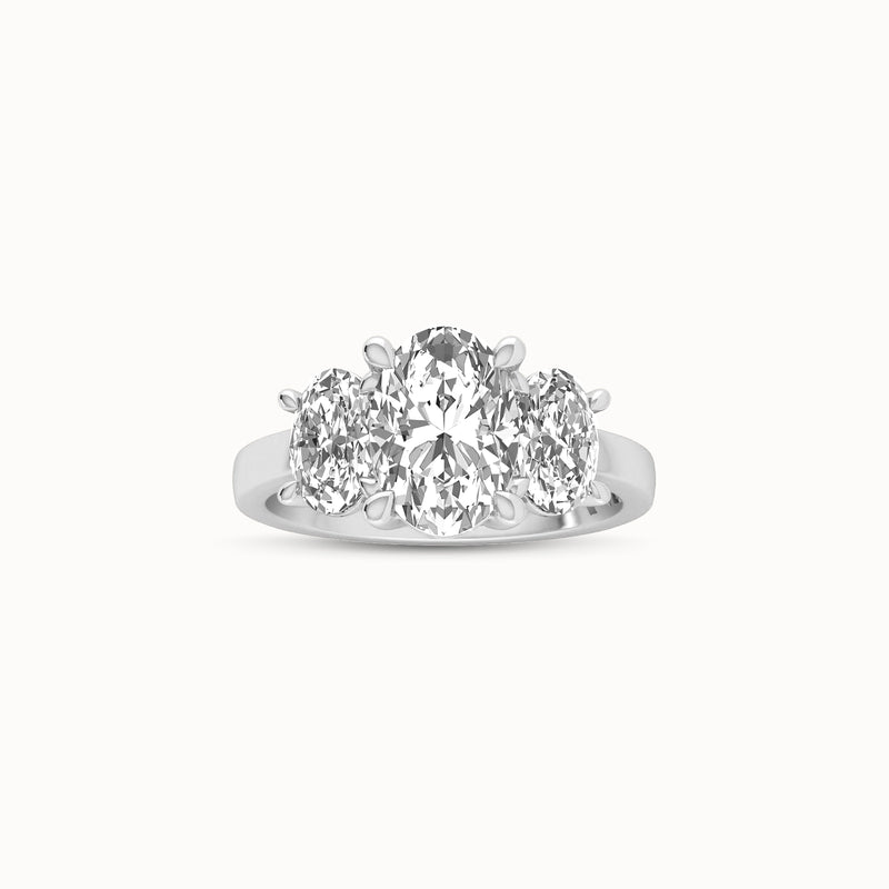 1OV202OV150 - Oval Three Stone Engagement Ring with Round Side Accents