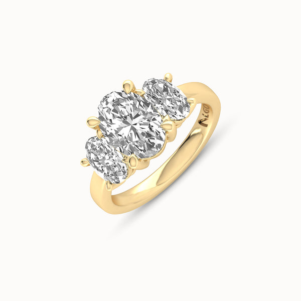 1OV202OV150 - Oval Three Stone Engagement Ring with Round Side Accents