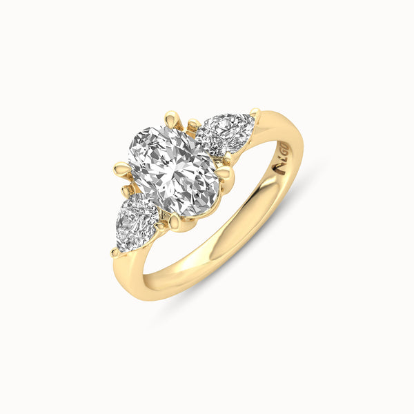 1OV102PS50 - Oval Three Stone Engagement Ring with Pear Side Accents