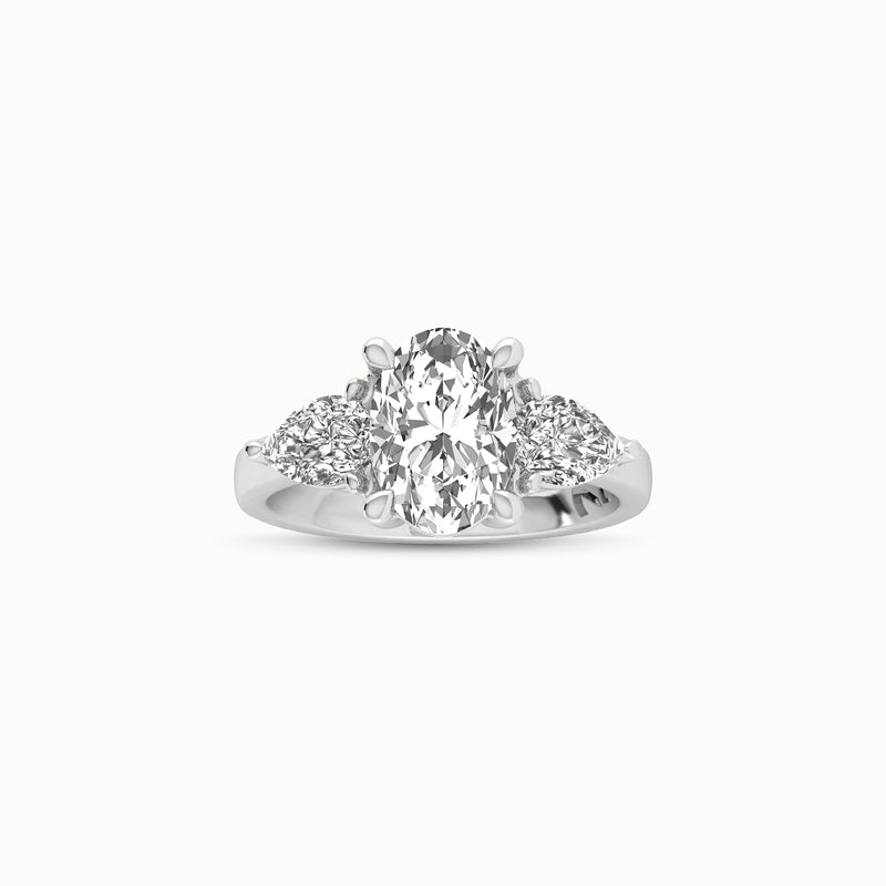1OV202PS100 - Oval Three Stone Engagement Ring with Pear Side Accents