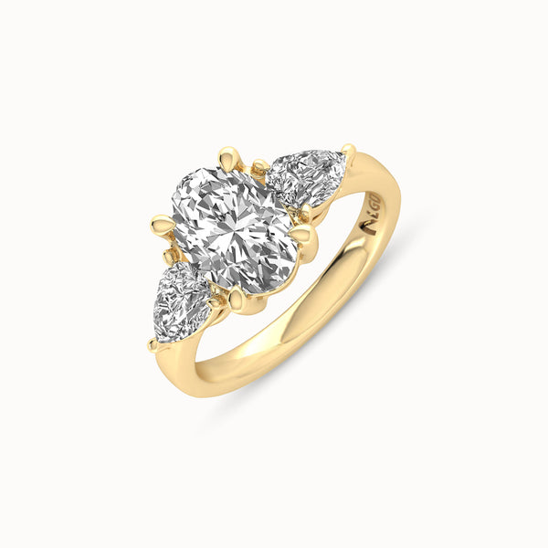 1OV202PS100 - Oval Three Stone Engagement Ring with Pear Side Accents