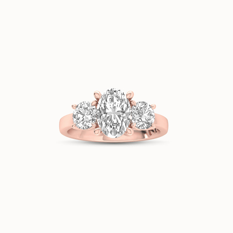 1OV152RD110 - Oval Three Stone Engagement Ring with Round Side Accents