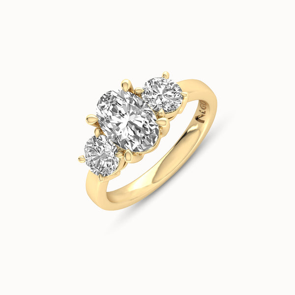 1OV152RD110 - Oval Three Stone Engagement Ring with Round Side Accents