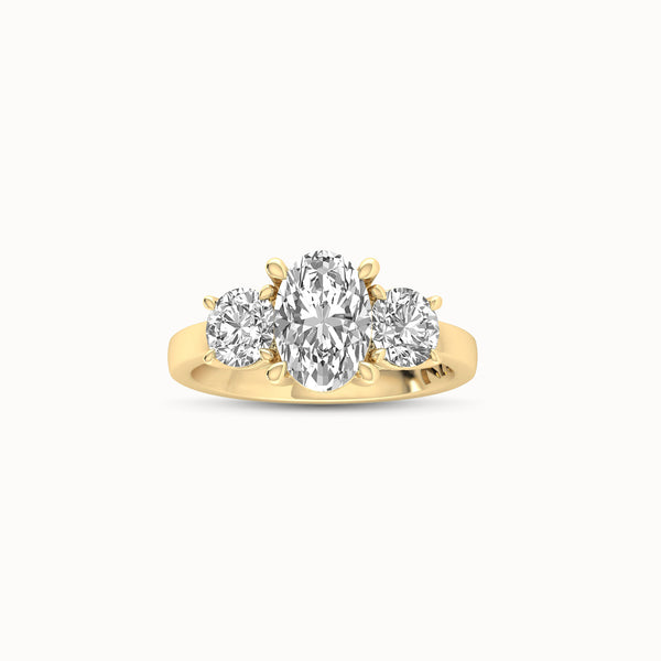1OV152RD110 - Oval Three Stone Engagement Ring with Round Side Accents