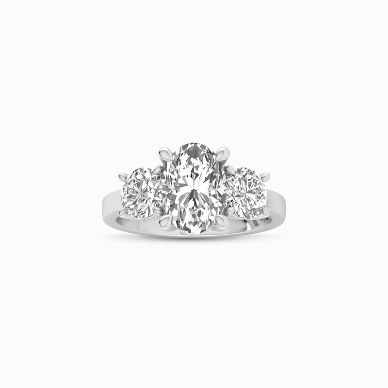 1OV202RD170 - Oval Three Stone Engagement Ring with Round Side Accents