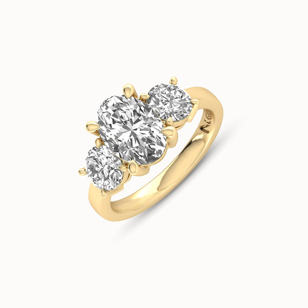 1OV202RD170 - Oval Three Stone Engagement Ring with Round Side Accents