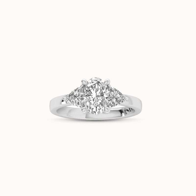 1OV102TR50 - Oval Three Stone Engagement Ring with Trillian Side Accents
